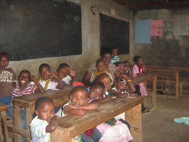 Mama Lucy with Children Singing Xmas Carol