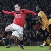 Wayne Rooney í baráttunni gegn úlfunum á Old  Trafford
