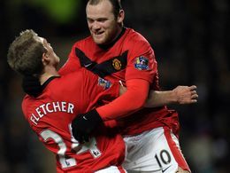 Rooney og Fletcher fagna