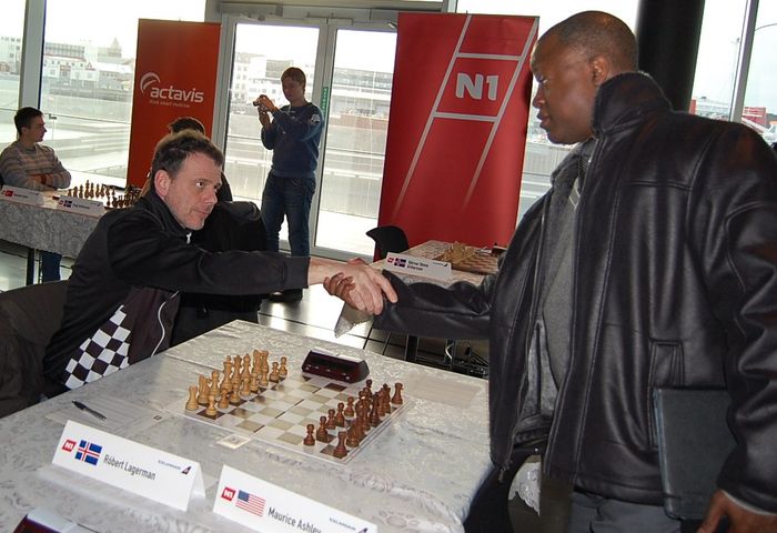 Rbert Lagerman and Maurice Ashley shaking hands
