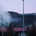 Gufurnar umlykja hlíðina. The steams rise from the hot springs