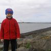 Halli flottur með vitann fyrir aftan sig