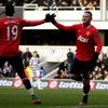Rooney fagnar marki sínu