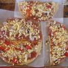 Flottar pizzur á leið inn í ofn