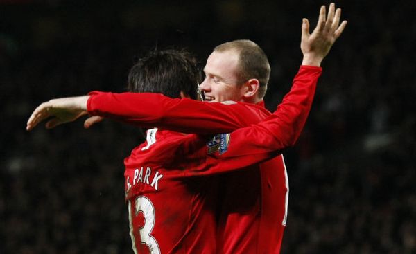 Wayne Rooney og Ji Sung Park